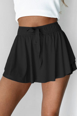 The “Move with Confidence” Black Tennis Skort